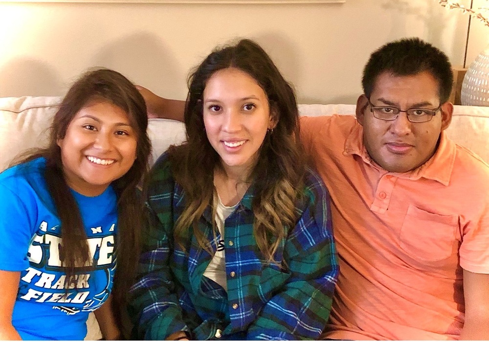 Ryan (right) with his sisters, Emily (middle) and Maria (left).